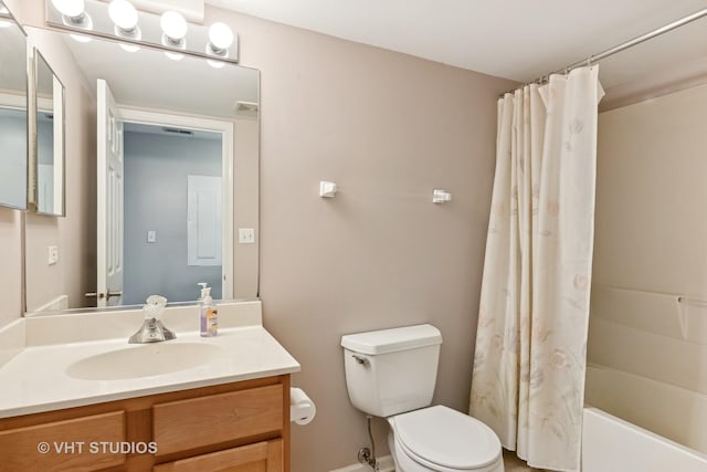 bathroom with visible vents, vanity, shower / bathtub combination with curtain, and toilet