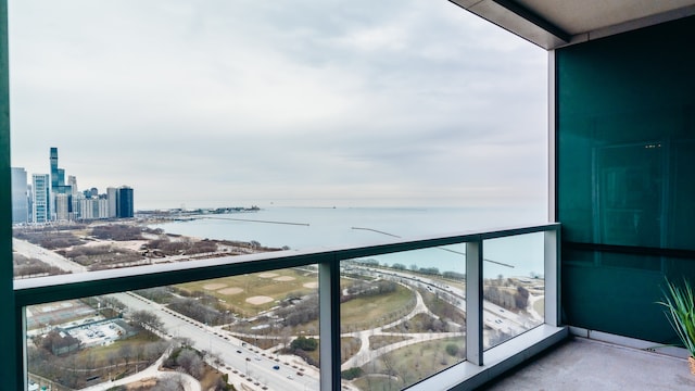 balcony with a city view and a water view
