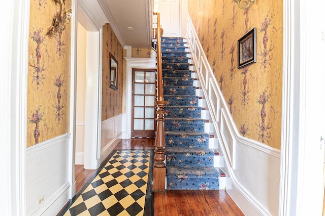105 S High St, Galena, IL 61036 - staircase with a wainscoted wall and wallpapered walls
