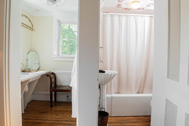 105 S High St, Galena, IL 61036 - bathroom with shower / tub combo, baseboards, ornamental molding, and wood finished floors