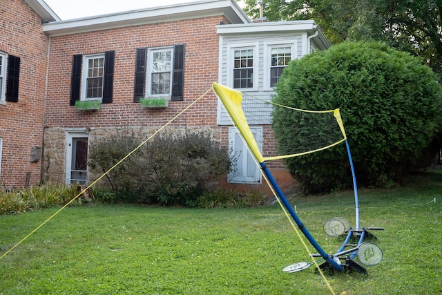 105 S High St, Galena, IL 61036 - view of play area featuring a lawn