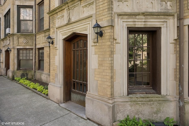 1225 W Lunt Ave Unit 2B, Chicago, IL 60626 - entrance to property with stone siding