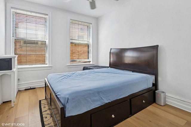 1225 W Lunt Ave Unit 2B, Chicago, IL 60626 - bedroom with light wood-type flooring and ceiling fan