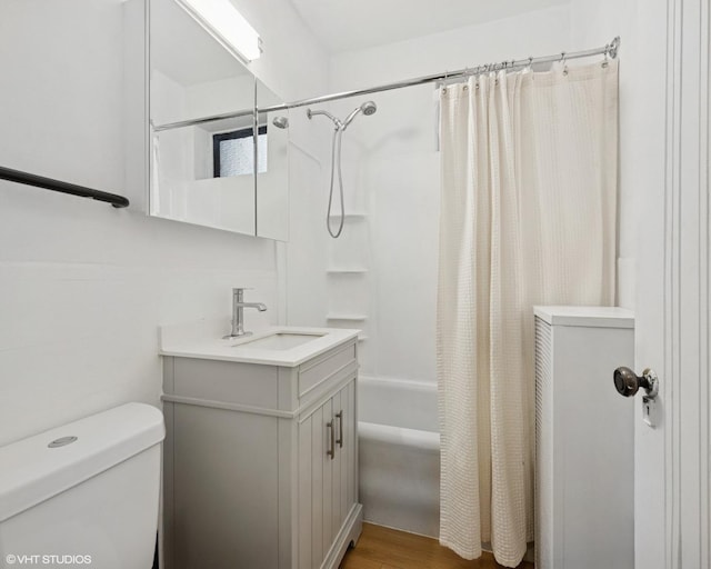 1225 W Lunt Ave Unit 2B, Chicago, IL 60626 - full bath with vanity, shower / bath combo with shower curtain, and wood finished floors