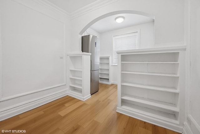 1225 W Lunt Ave Unit 2B, Chicago, IL 60626 - spacious closet with arched walkways and light wood finished floors
