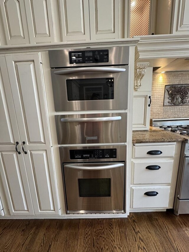 3009 Fox Glen Ct, Saint Charles, IL 60174 - kitchen featuring stone countertops, oven, a warming drawer, and decorative backsplash