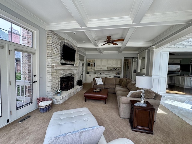 living area featuring crown molding, light colored carpet, beamed ceiling, and visible vents