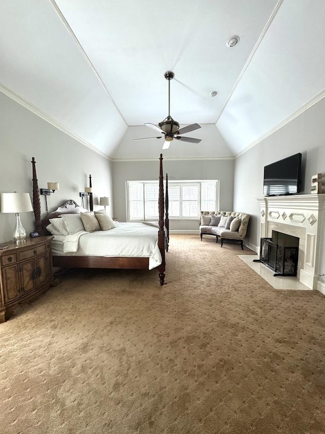 bedroom featuring carpet flooring, baseboards, a fireplace with flush hearth, and lofted ceiling