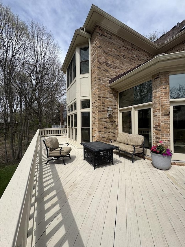 deck with outdoor lounge area