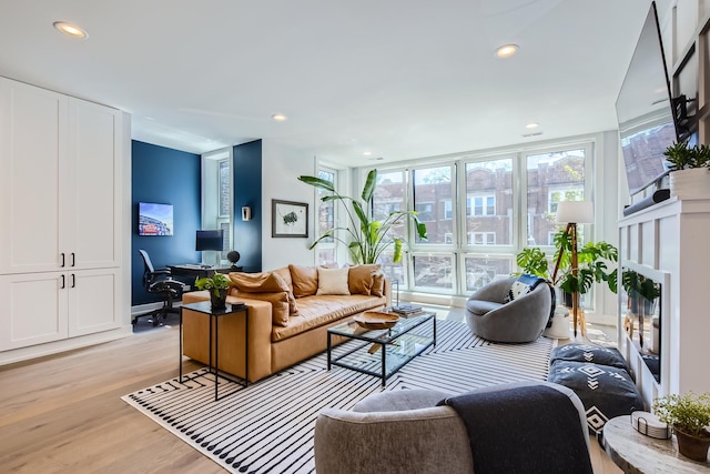 1462 W Winnemac Ave Unit 2, Chicago, IL 60640 - living room featuring light wood-style flooring and recessed lighting