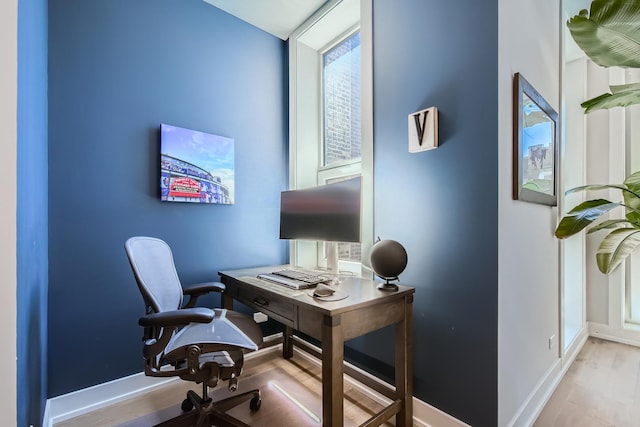 1462 W Winnemac Ave Unit 2, Chicago, IL 60640 - home office with baseboards and wood finished floors