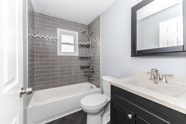 full bathroom with vanity, shower / bathing tub combination, and toilet