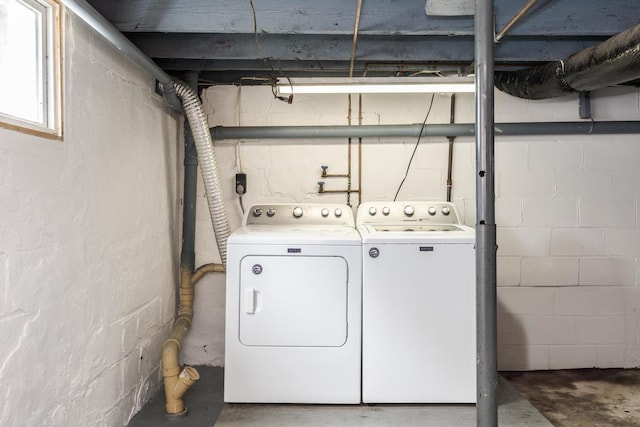 laundry area featuring laundry area and washing machine and dryer