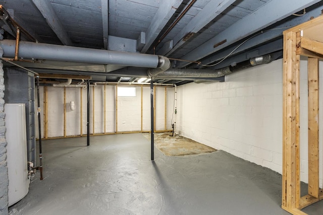 basement featuring water heater