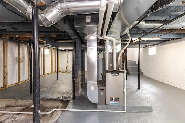 basement featuring heating unit