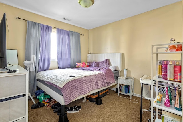 carpeted bedroom with visible vents