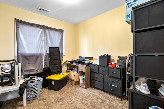 interior space featuring visible vents and carpet