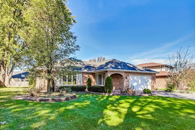 14506 Mallard Dr, Homer Glen, IL 60491 - ranch-style home featuring brick siding, a front yard, driveway, and a garage