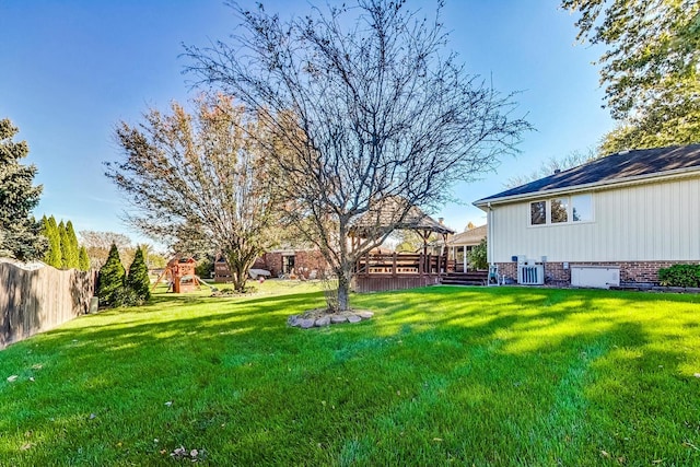 14506 Mallard Dr, Homer Glen, IL 60491 - view of yard with central air condition unit, fence, a playground, and a gazebo