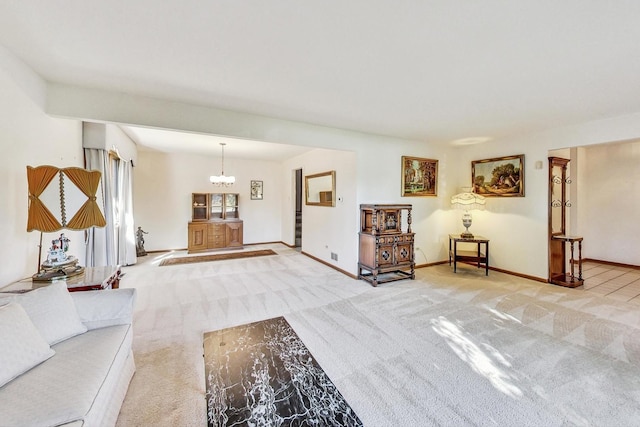 14506 Mallard Dr, Homer Glen, IL 60491 - living room featuring baseboards, an inviting chandelier, visible vents, and carpet