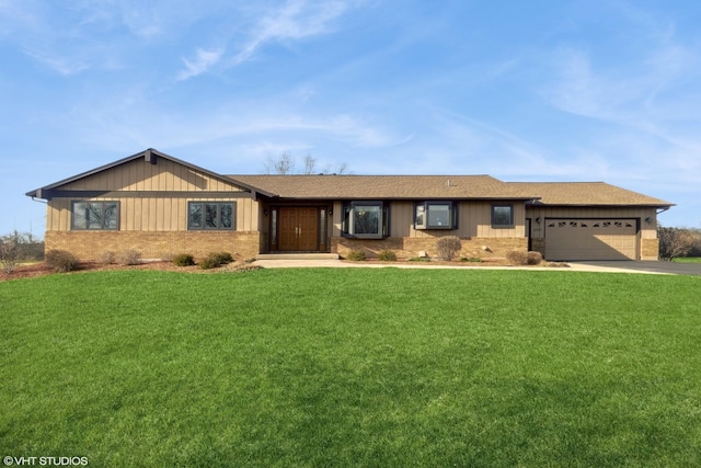 12524 Grandview Dr, Huntley, IL 60142 - single story home featuring a garage, concrete driveway, a front yard, and brick siding