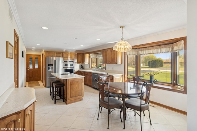 12524 Grandview Dr, Huntley, IL 60142 - dining space featuring a chandelier, ornamental molding, light tile patterned floors, baseboards, and recessed lighting