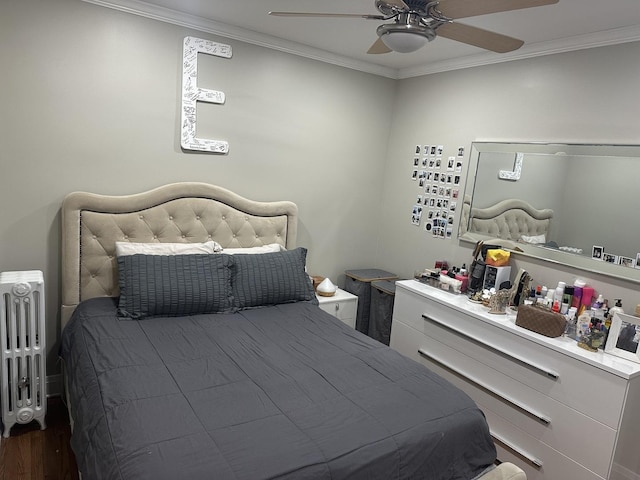 bedroom featuring radiator heating unit, ornamental molding, a ceiling fan, and dark wood finished floors