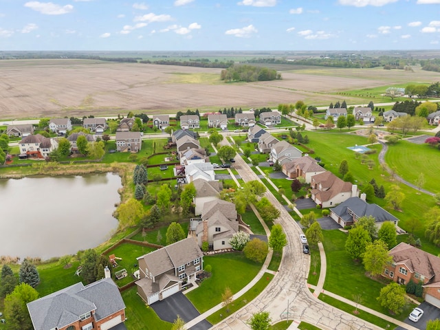 aerial view of residential area with a nearby body of water