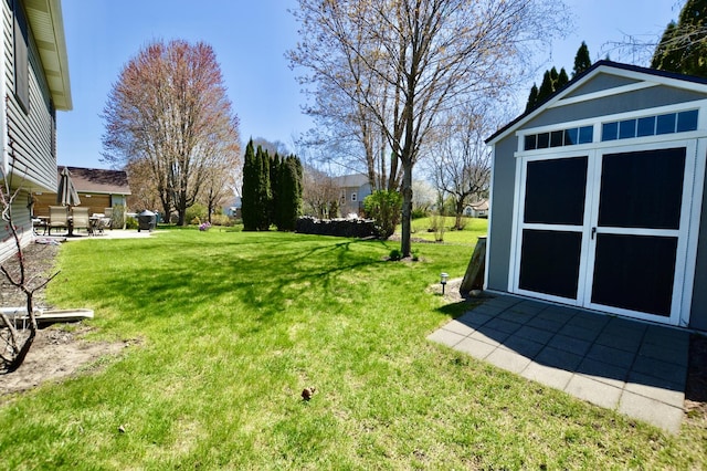 3707 Geneva Pl, Mchenry, IL 60050 - view of yard featuring an outdoor structure, a patio, and a shed