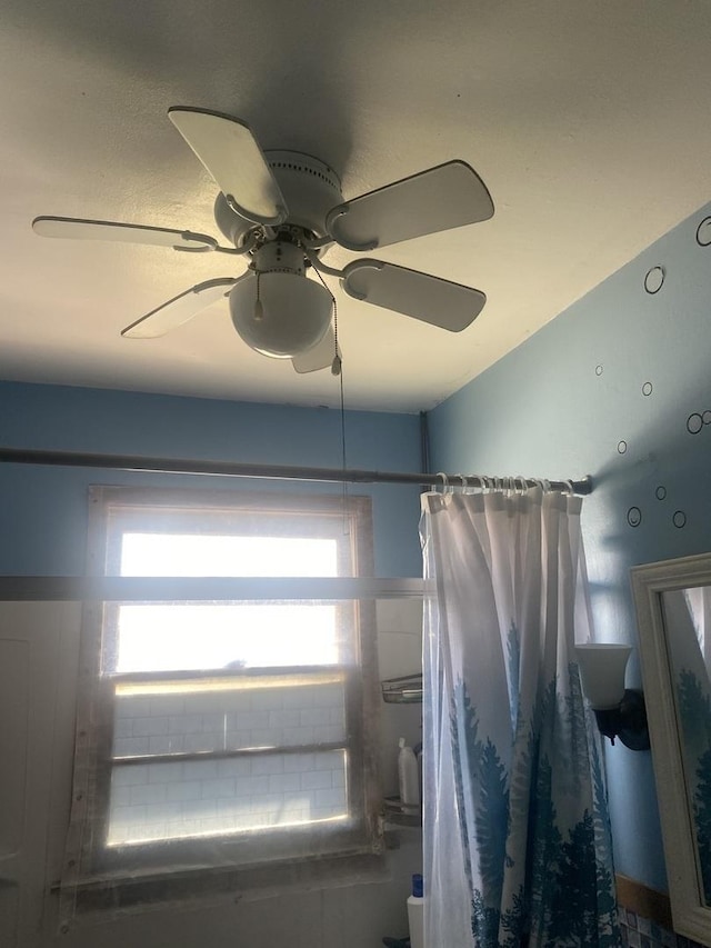 1716 Rogers Ave, Mchenry, IL 60050 - bathroom featuring a shower with curtain and ceiling fan