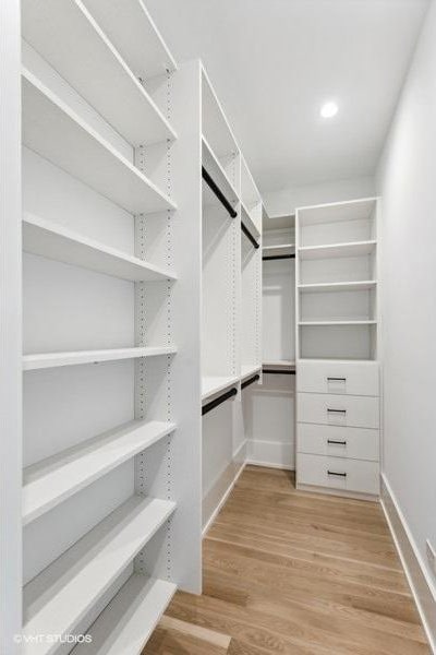 walk in closet featuring light wood-type flooring