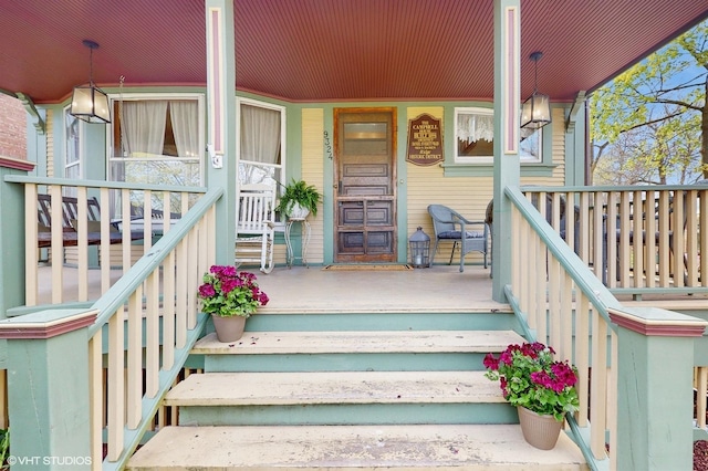 property entrance with a porch