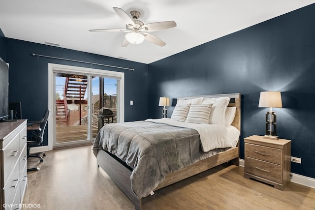 bedroom featuring access to exterior, visible vents, baseboards, ceiling fan, and light wood-style floors