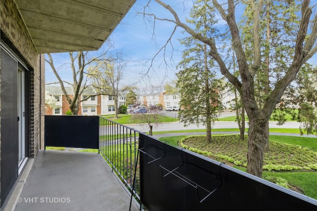 balcony featuring a residential view