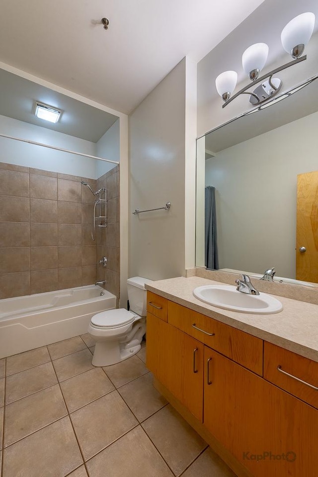 full bath featuring tile patterned flooring, vanity, toilet, and shower / bath combination with curtain