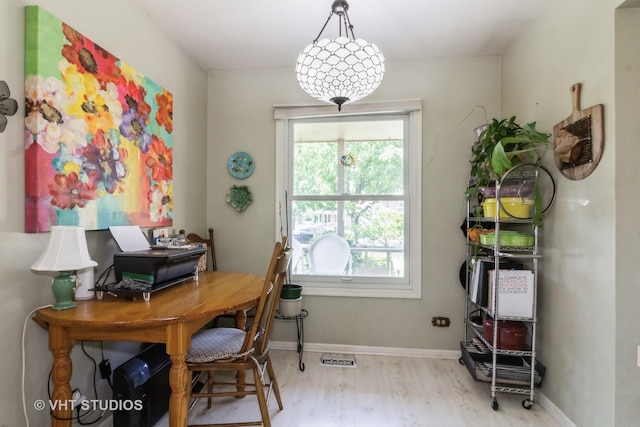 office area featuring wood finished floors and baseboards