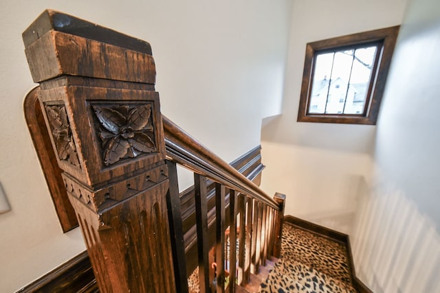 staircase with baseboards