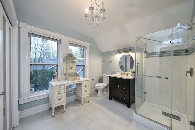 bathroom with vanity, toilet, baseboards, a shower stall, and vaulted ceiling