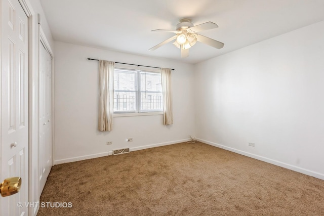 7010 S E End Ave Unit 4, Chicago, IL 60649 - unfurnished bedroom with carpet flooring, a ceiling fan, visible vents, and baseboards