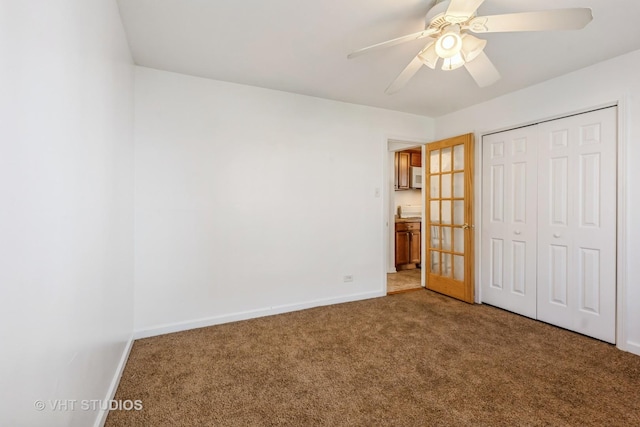 7010 S E End Ave Unit 4, Chicago, IL 60649 - unfurnished bedroom featuring a closet, carpet floors, and baseboards