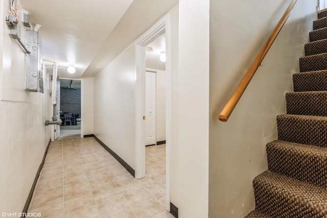 7010 S E End Ave Unit 4, Chicago, IL 60649 - staircase with baseboards and tile patterned flooring