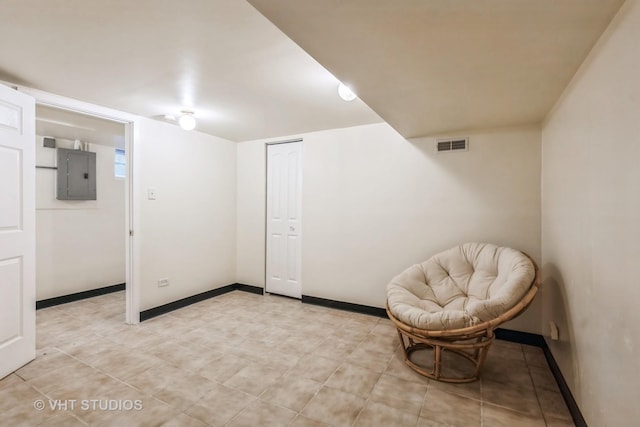 7010 S E End Ave Unit 4, Chicago, IL 60649 - living area with visible vents, electric panel, and baseboards