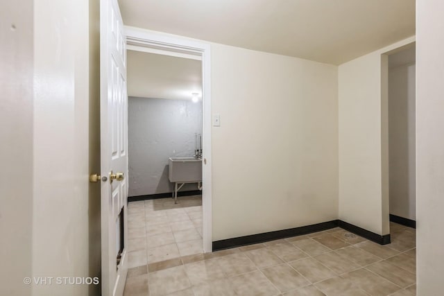 7010 S E End Ave Unit 4, Chicago, IL 60649 - empty room featuring light tile patterned floors and baseboards
