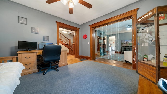 office with ceiling fan and wood finished floors