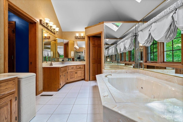 bathroom with lofted ceiling, tile patterned flooring, a tub with jets, and double vanity