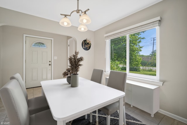 4363 W Kennedy Dr, Gurnee, IL 60031 - dining room with light tile patterned flooring and arched walkways