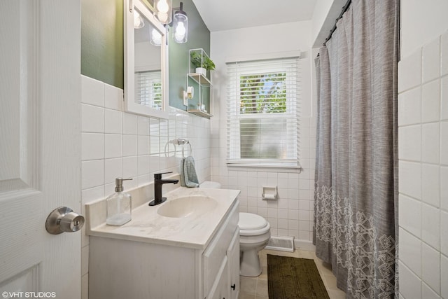 4363 W Kennedy Dr, Gurnee, IL 60031 - full bathroom featuring tile walls, vanity, tile patterned floors, and a shower with shower curtain