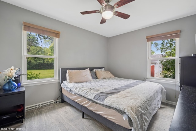 4363 W Kennedy Dr, Gurnee, IL 60031 - bedroom featuring wood finished floors, multiple windows, and ceiling fan