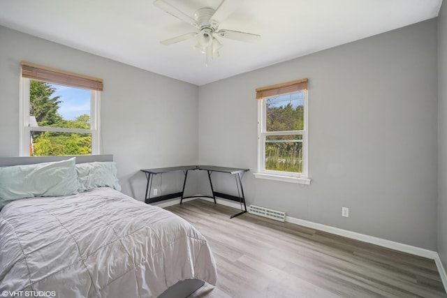 4363 W Kennedy Dr, Gurnee, IL 60031 - bedroom with wood finished floors and a ceiling fan