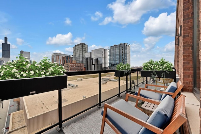 balcony featuring a view of city